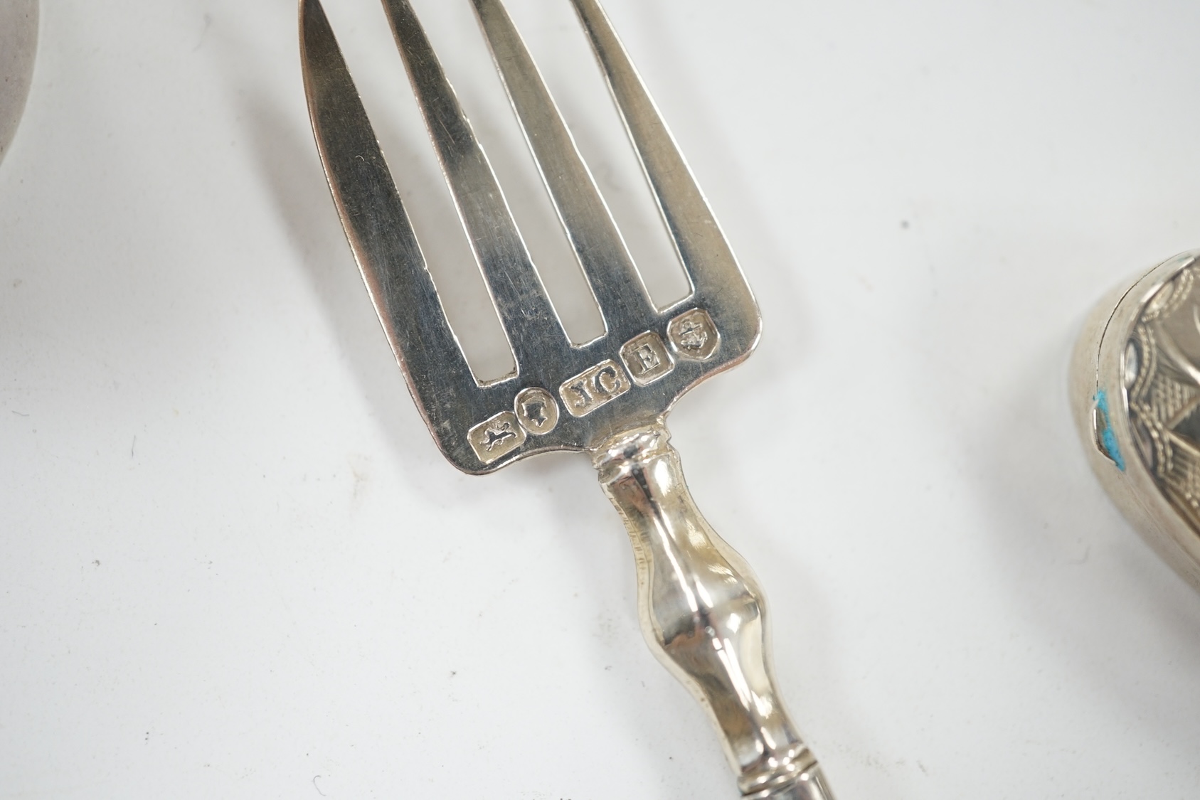 Small silver including a late Victorian slide action pill box, Birmingham, 1890, a heart shaped pill box, a book mark, pencil, pickle fork and a button hook